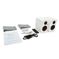 Contenido de la caja del VULKKANO DESK: altavoces, soportes inclinados, mando, cables y manual